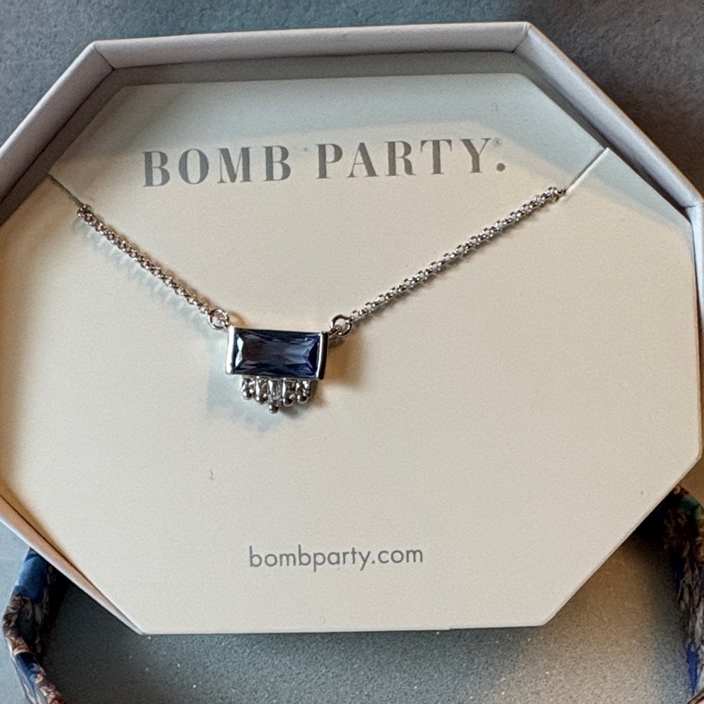 Bomb Party Silver Necklace with Blue Gem